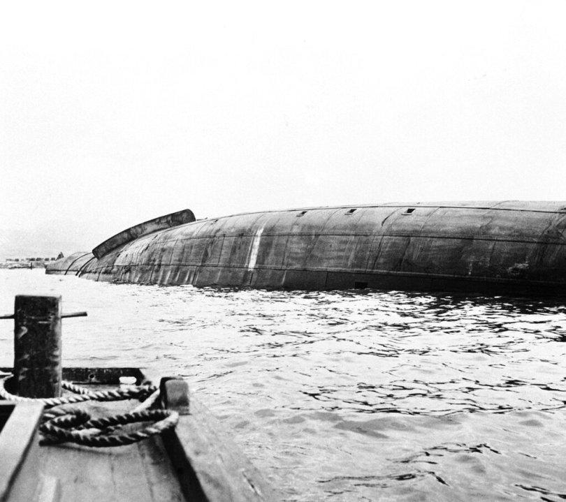 The wreckage of the U.S.S. Oklahoma as it lies in the mud at Pearl Harbor, Hawaii after the Japanese aerial attack on Dec. 7, 1941. (AP Photo)