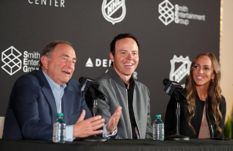 Commissioner Gary Bettman meets with Utah NHL team owners Ryan Smith and Ashley Smith.