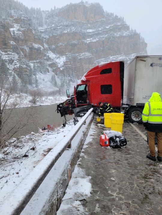 Crashed commercial motor vehicle on I-70 in Glenwood Canyon on April 12, 2022. Guardrail was damaged by the crash. The CMV was traveling eastbound.