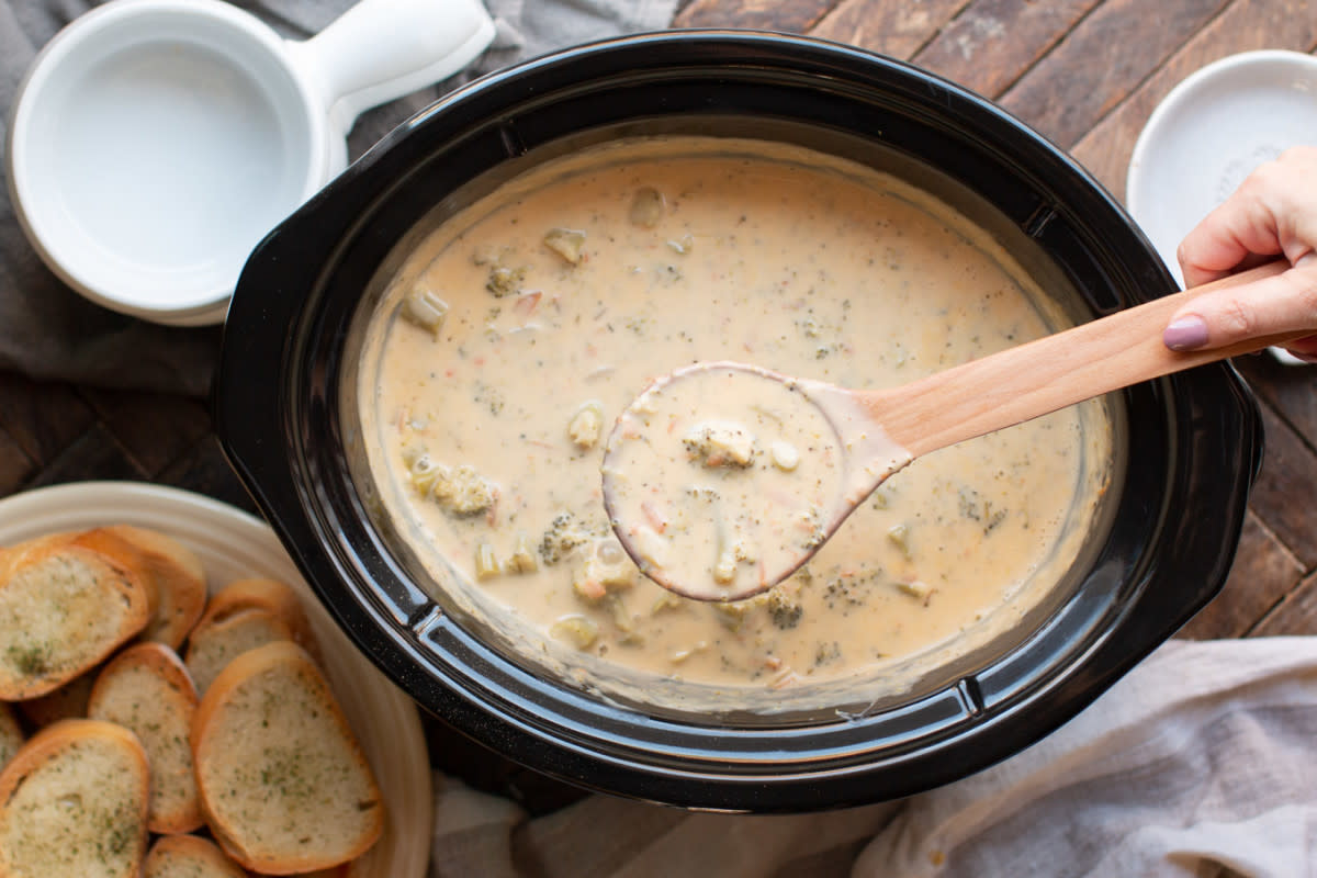 <p>The Magical Slow Cooker</p><p>This is a Panera bread copycat recipe. Enough to feed a crowd at a fraction of the price.</p><p><strong>Get the Recipe: <a href="https://www.themagicalslowcooker.com/slow-cooker-broccoli-cheese-soup/" rel="nofollow noopener" target="_blank" data-ylk="slk:Crock Pot Broccoli Cheese Soup;elm:context_link;itc:0;sec:content-canvas" class="link rapid-noclick-resp">Crock Pot Broccoli Cheese Soup</a></strong></p>