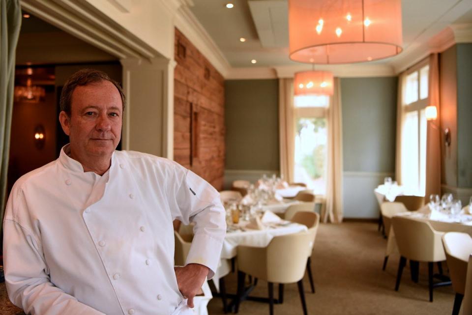 Cafe Panache's Kevin Kohler in one of his two charming dining rooms.