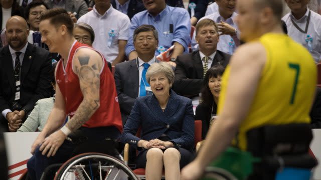 Theresa May watches a game of wheelchair basketball between Great Britain and Australia in Tokyo