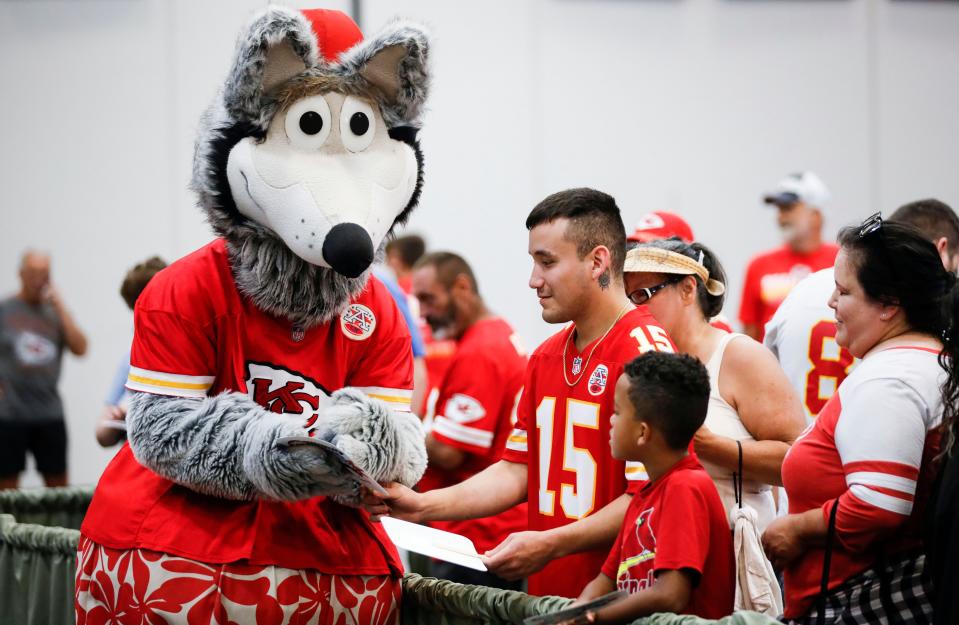 The Kansas City Chiefs mascot KC Wolf signs autographs at the Springfield Expo Center on Friday, Aug 11, 2023.