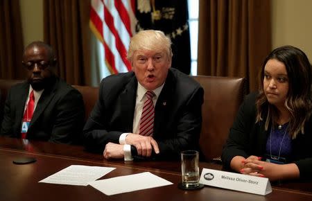 U.S. President Donald Trump talks to the media during his meeting with immigration crime victims at the White House in Washington, U.S., June 28, 2017. REUTERS/Yuri Gripas