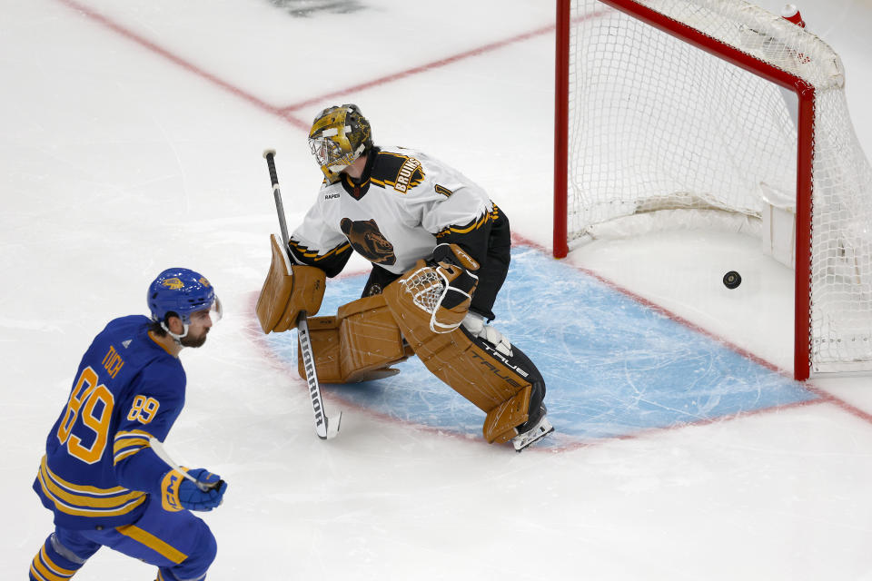 Buffalo Sabres right wing Alex Tuch (89) scores a goal past Boston Bruins goaltender Jeremy Swayman (1) during the second period of an NHL hockey game, Saturday, Dec. 31, 2022, in Boston. (AP Photo/Mary Schwalm)