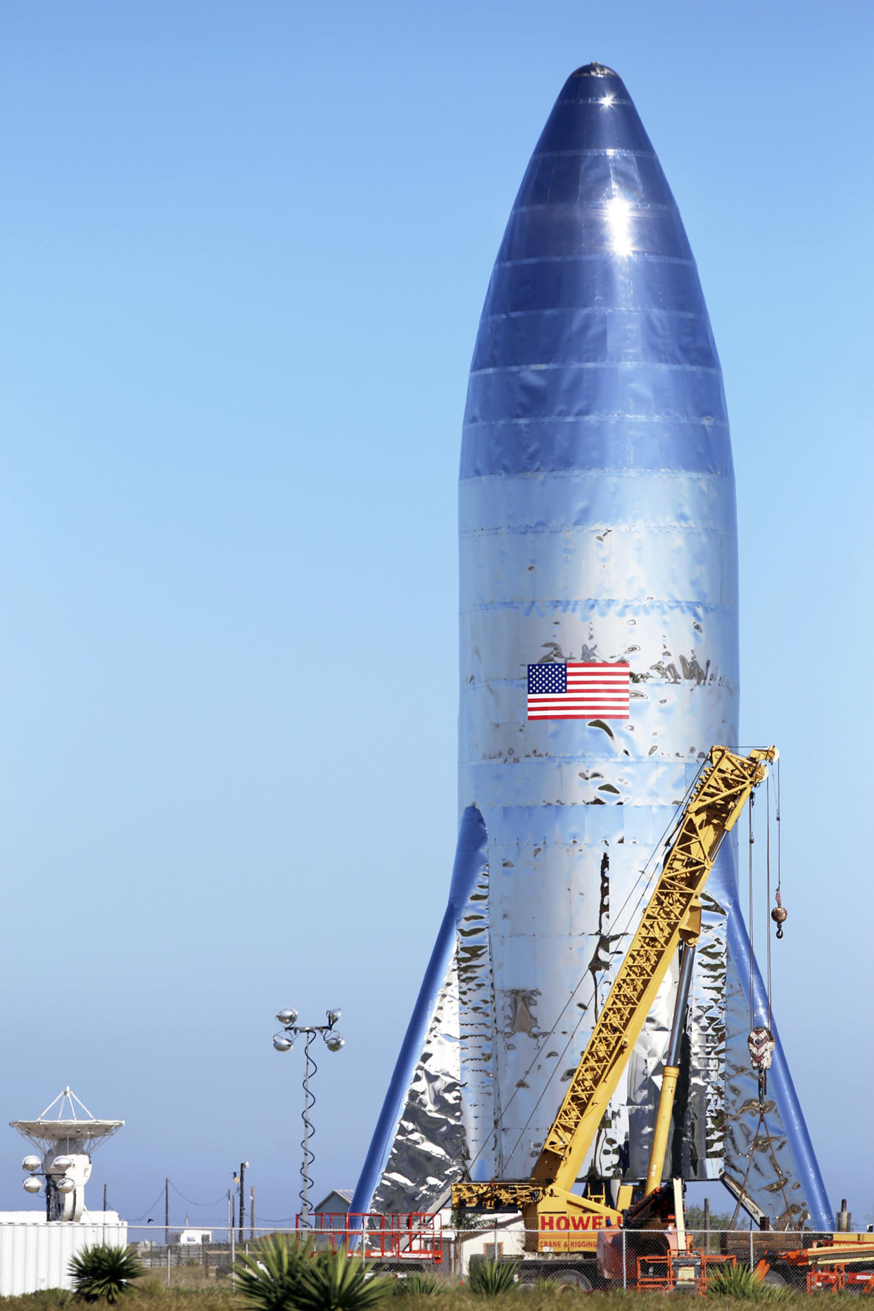 The SpaceX prototype Starship hopper stands at the Boca Chica Beach site in Texas