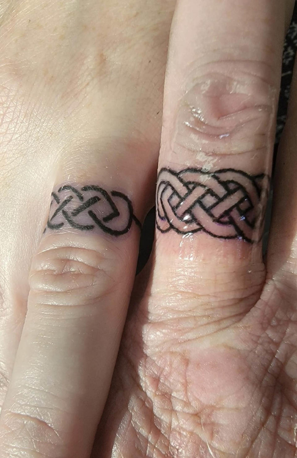 Jamie West and Drew Schmitt's wedding ring tattoos. (Courtesy Jamie West)