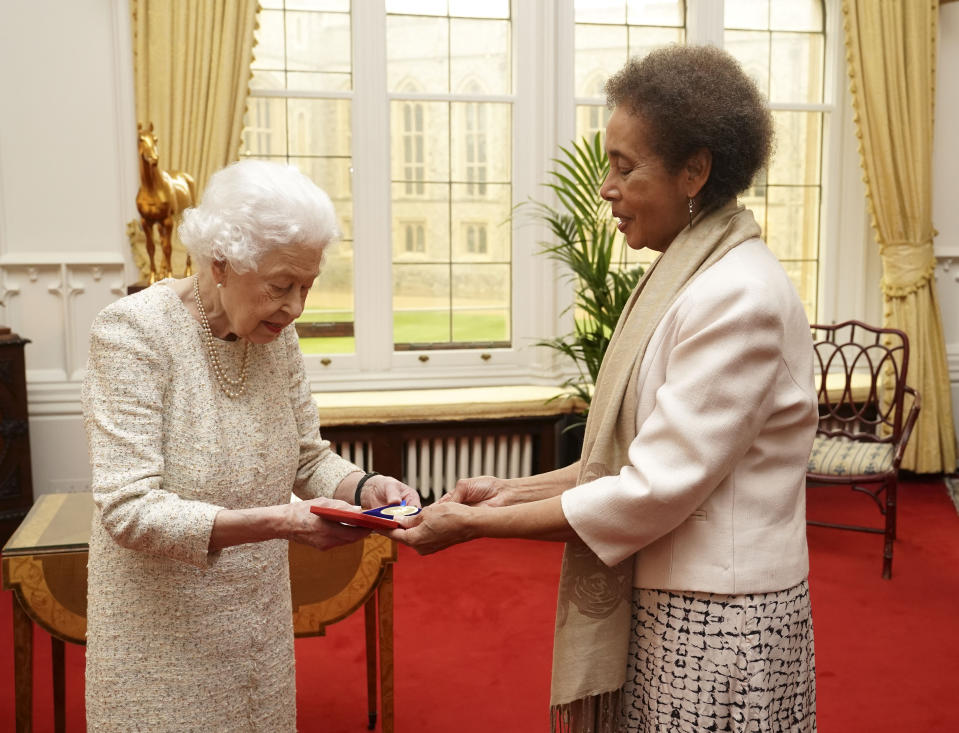 The monarch presenting the Queen’s Gold Medal for Poetry to Grace Nichols during a private audience at Windsor Castle (Steve Parsons/PA)