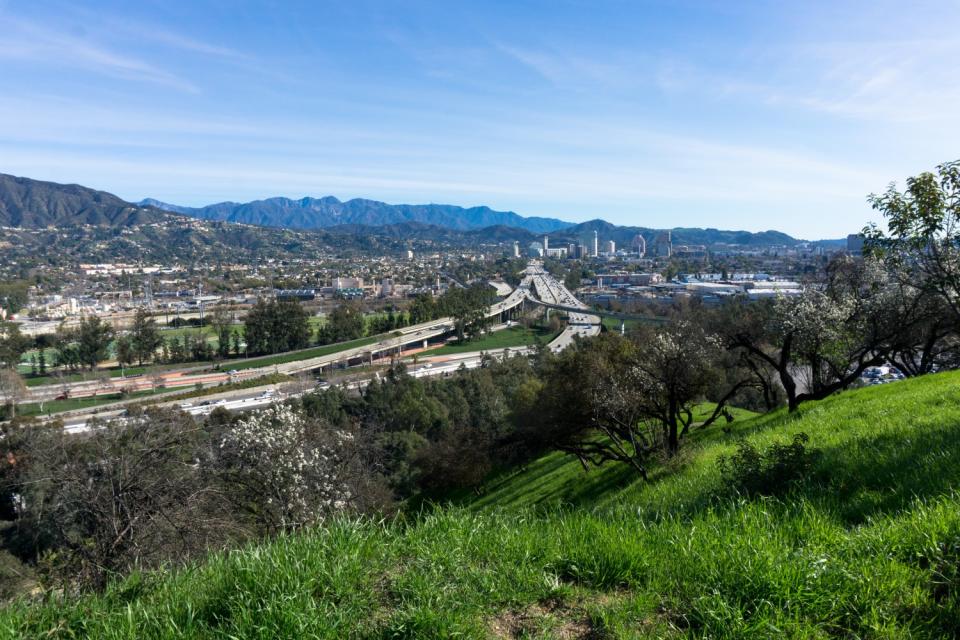 The sprawl of L.A., highways hemmed in by mountains, from the Skyline Trail.