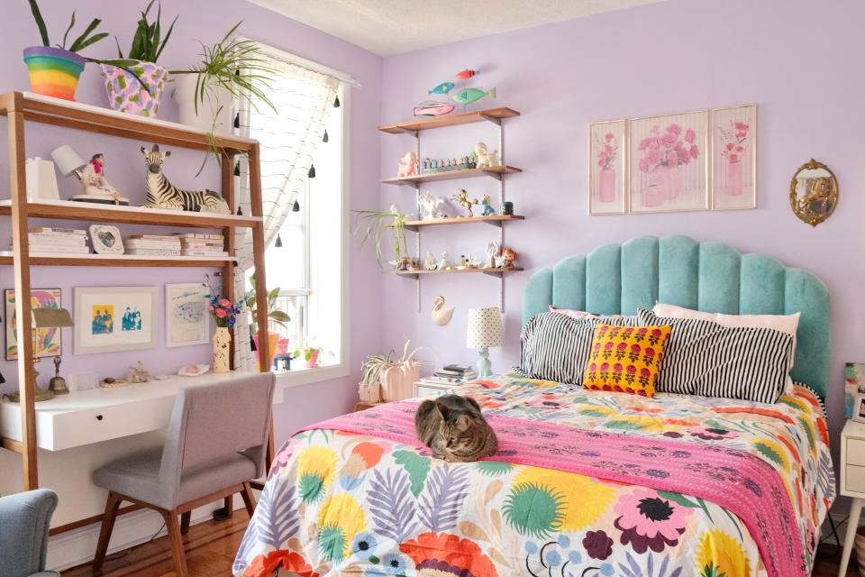 The bedroom’s official theme is floral. Buzz brought the floral triptych from their collection and the couple purchased the duvet by Marimekko, a like-minded pattern enthusiast. A West Elm desk was found secondhand on Craigslist.
