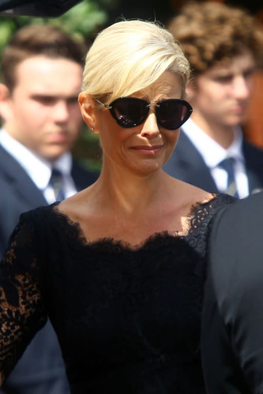 Lorraine Downes, the wife of Martin Crowe, bids farewell to the former New Zealand cricketer during his funeral at the Holy Trinity Cathedral in Auckland on March 11, 2016