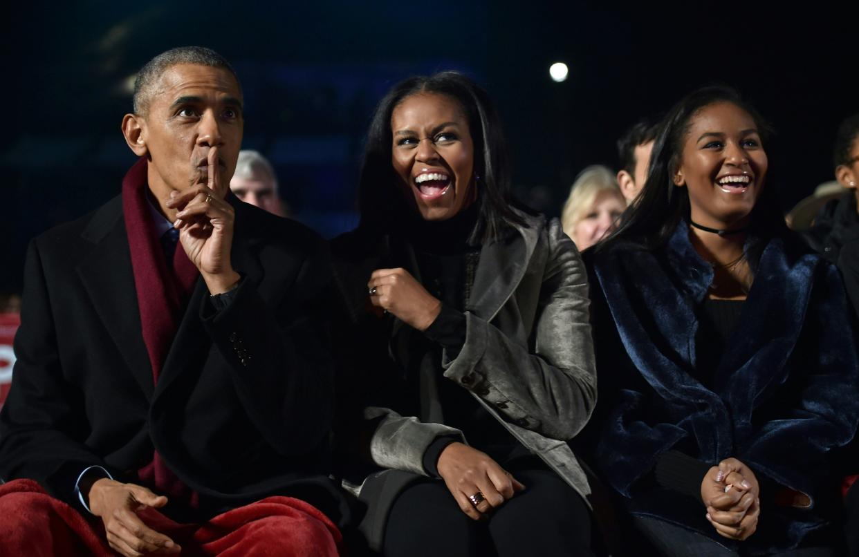 Barack Obama, Michelle Obama and daughter Sasha, who just turned 21, pictured at the National Christmas Tree Lighting in 2016. (Photo: NICHOLAS KAMM/AFP via Getty Images)