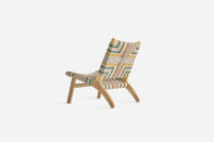 This product image shows a handcrafted baby chair from the furniture company Masaya. The company owns tree farms on deforested cow pastures in Nicaragua. Handmade gifts are good options for the holidays. (Masaya via AP)