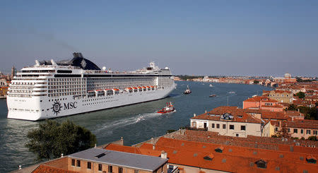 FILE PHOTO: The MSC Musica cruise ship is seen in Venice lagoon, Italy June 17, 2012. REUTERS/Stefano Rellandini/File Photo