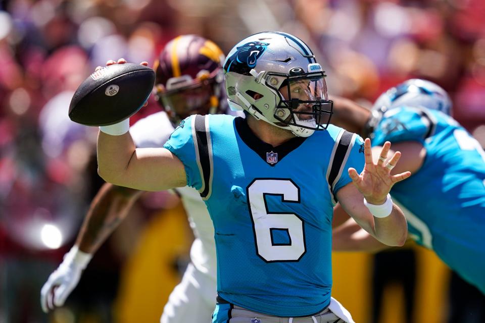Carolina Panthers quarterback Baker Mayfield throws a pass during the first half of the team's preseason game against the Washington Commanders Aug. 13.