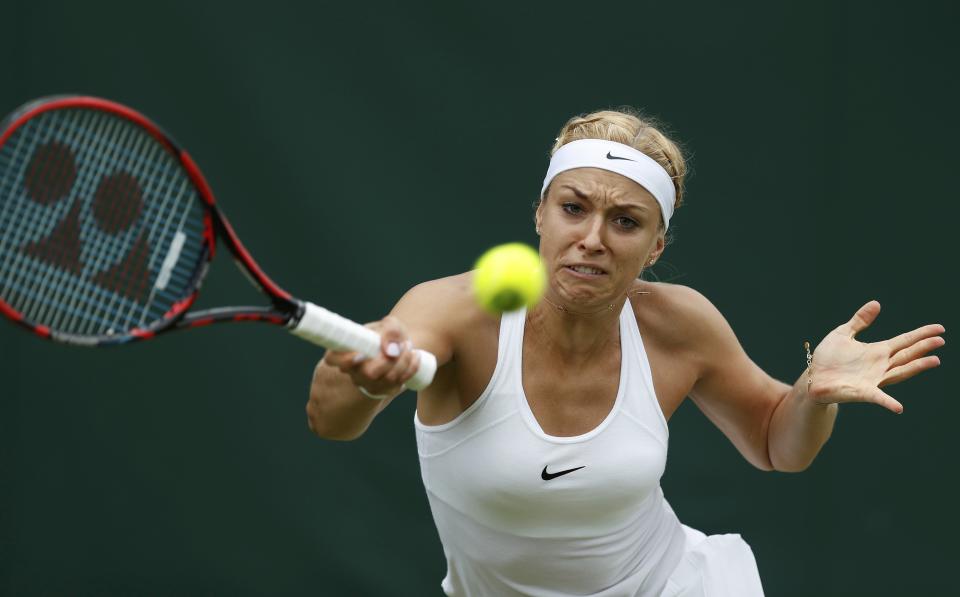 Britain Tennis - Wimbledon - All England Lawn Tennis & Croquet Club, Wimbledon, England - 30/6/16 Germany's Sabine Lisicki in action against Australia's Samantha Stosur REUTERS/Paul Childs