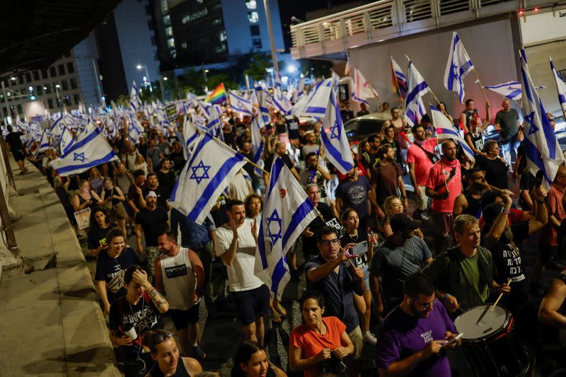 Protesters demonstrate against Israeli PM Netanyahu and his nationalist coalition government's judicial overhaul, in Tel Aviv