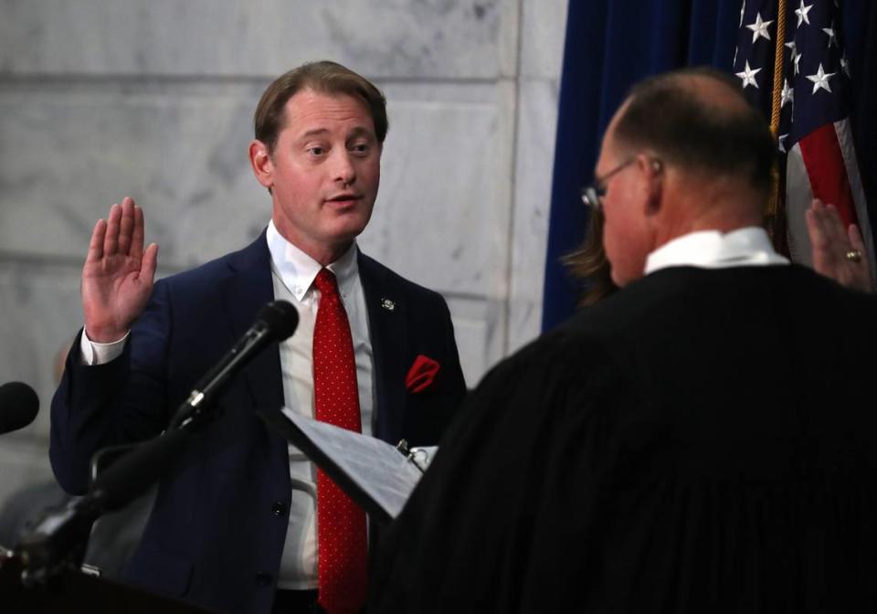 Secretary of State Michael Adams is sworn in by Honorable Christopher Shea Nickell, Justice Supreme Court of Kentucky, at the Swearing-In Ceremony of the Constitutional Officers at the Kentucky Capitol. Jan. 2, 2024