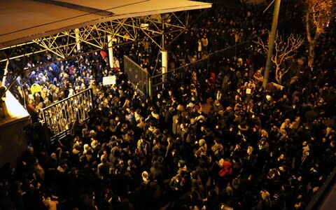  Iranians shout slogans against the government after a vigil held for the victims  - Credit: Photo by Fatemeh Bahrami/Anadolu Agency via Getty Images