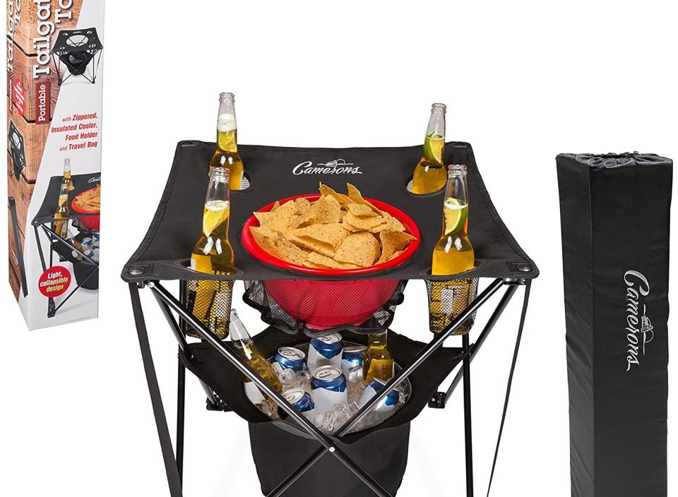 Whether you're camping or hanging out before the big game, you need this tailgate table. (Source: Amazon)
