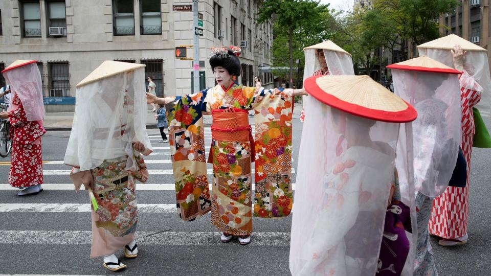 <div>Performers prepare for the Japanese Culture Parade on May 14, 2022 in New York City. (Photo by Liao Pan/China News Service via Getty Images)</div>