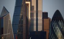 FILE PHOTO: Skyscrapers in The City of London financial district are seen in London