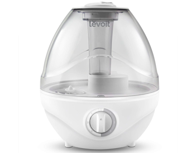 Teardrop shaped humidifier with clear top for water and knob toward the base for control. 