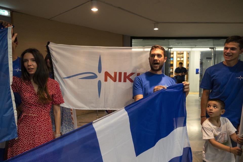 Supporters shout slogans during an election rally of Niki party, in Athens, Greece, Thursday, June 22, 2023. Three far-right and two far-left, could conceivably cross the 3% parliamentary entry threshold in Sunday's elections, despite a swing back to mainstream politicians as the scars of Greece's 10-year financial crisis gradually heal. (AP Photo/Yorgos Karahalis)