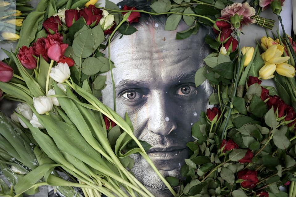 February 19, 2024: Flowers are seen placed around a portrait of late Russian opposition leader Alexei Navalny at a makeshift memorial in front of the former Russian consulate in Frankfurt, Germany, three days after Navalny died in a Russian Arctic prison. Navalny's widow Yulia Navalnaya accused Russian President Putin of killing her husband and vowed to continue Navalny's work.