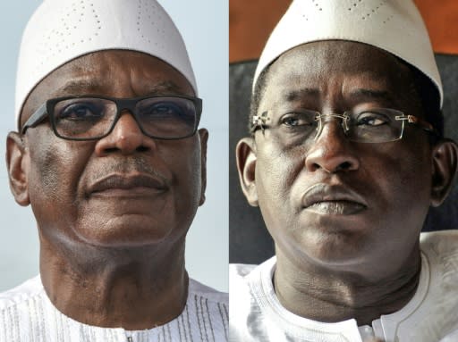 President Ibrahim Boubacar Keita (L) won a landslide victory against opposition leader Soumaila Cisse (R), according to official results