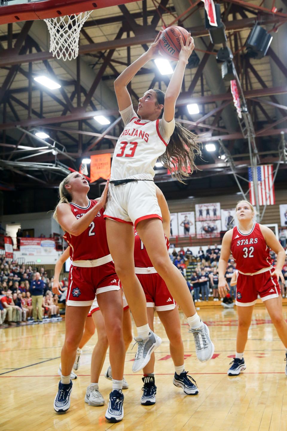 Center Grove Rachel Wirts (33) goes up for a lay up as Bedford North Lawrence takes on Center Grove High School in the Girls Class 4A IHSAA Region 7 basketball championship, Feb 10, 2024; Bedford, IN, USA; at Bedford North Lawrence High School.