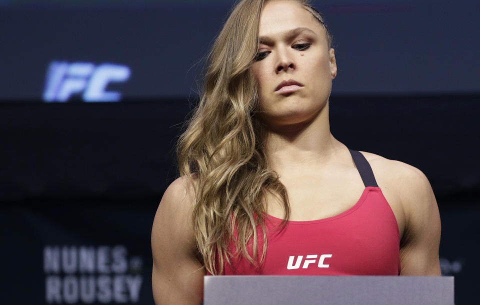 Ronda Rousey poses for photographers during an event for UFC 207, Thursday, Dec. 29, 2016, in Las Vegas. Rousey is scheduled to fight Amanda Nunes in a mixed martial arts women's bantamweight championship bout Saturday in Las Vegas. (AP Photo/John Locher)