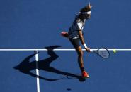 Tennis - Australian Open - Melbourne Park, Melbourne, Australia - 18/1/17 Switzerland's Roger Federer hits a shot during his Men's singles second round match against Noah Rubin of the U.S. REUTERS/Thomas Peter