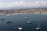 Luxury yachts are seen in an aerial view of Bay of Cannes during the 60th Cannes Film Festival, in this May 15, 2007 file picture. REUTERS/Jean-Paul Pelissier/Files