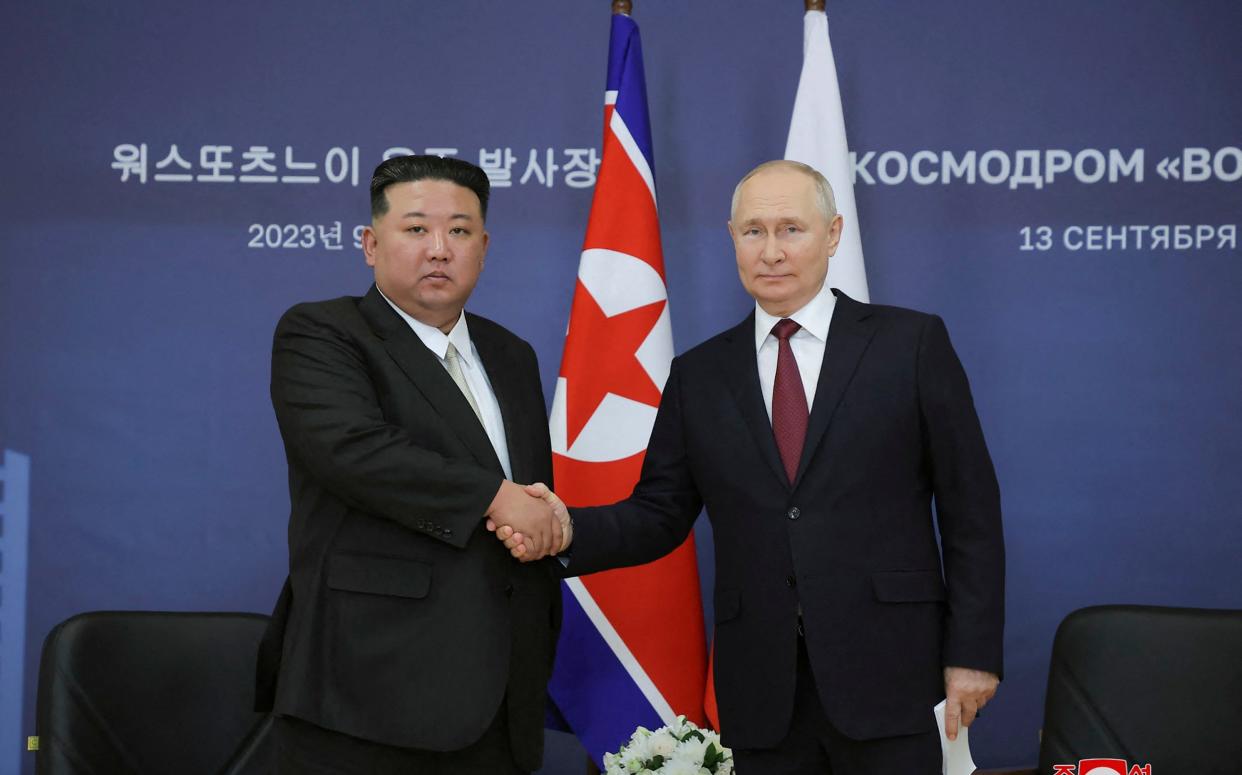 Vladimir Putin meets Kim Jong Un