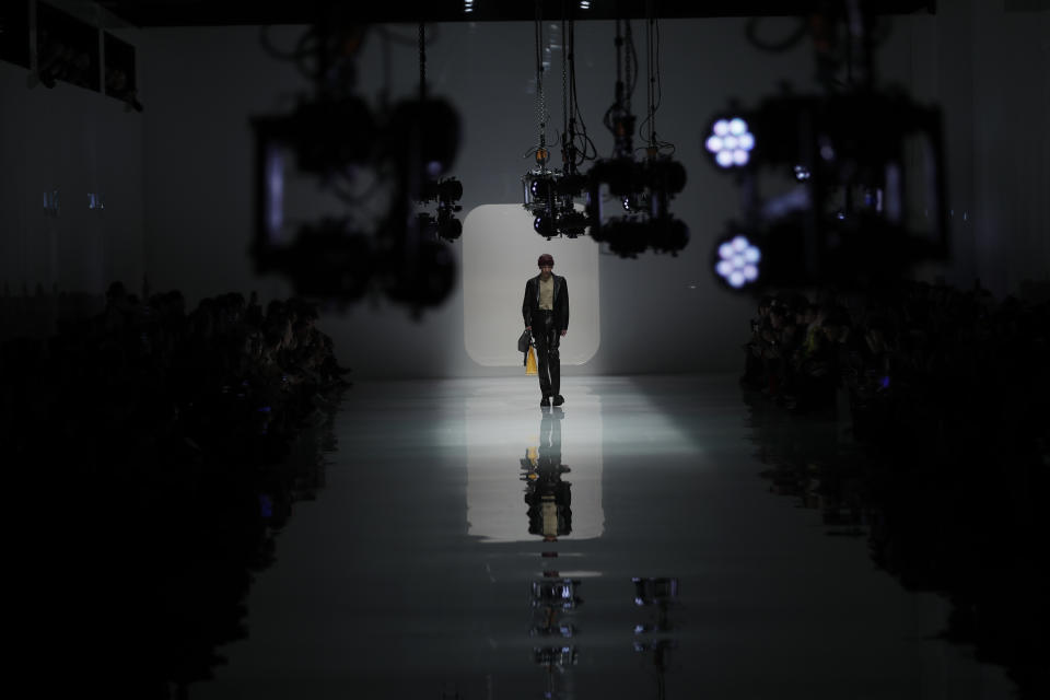 A model wears a creation as part of the Fendi men's Fall-Winter 2020/21 collection, that was presented in Milan, Italy, Monday, Jan. 13, 2020. (AP Photo/Antonio Calanni)