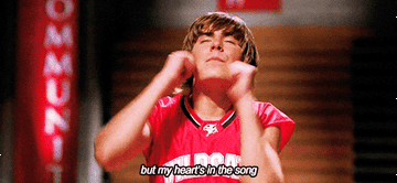 Troy Bolton singing passionately in "High School Musical"