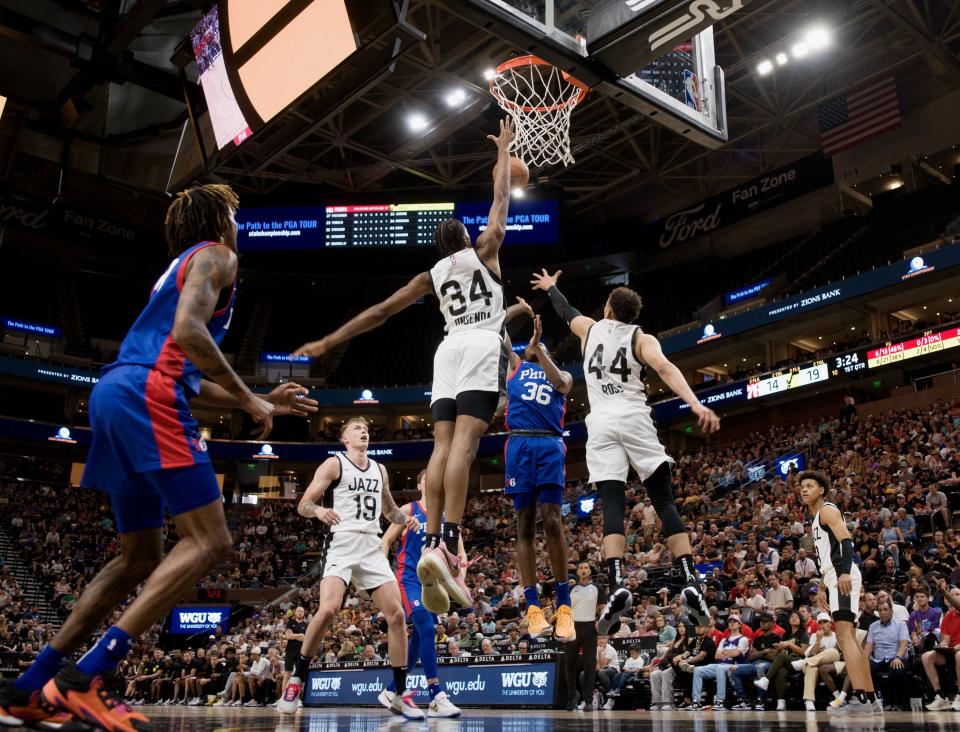 Utah Jazz center Nick Ongenda (34) and Utah Jazz guard Colbey Ross (44) try to defend Philadelphia 76ers guard DJ Steward (36) on a shot as the Utah Jazz and Philadelphia 76ers play in Summer League action at the Delta Center in Salt Lake City on Wednesday, July 5, 2023. | Scott G Winterton, Deseret News