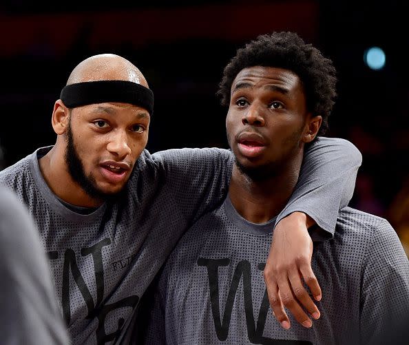 Adreian Payne #33 of the Minnesota Timberwolves leans on Andrew Wiggins #22 during practice before the game against the Los Angeles Lakers at Staples Center on October 28, 2015 in Los Angeles, California.    (Photo by Harry How/Getty Images)