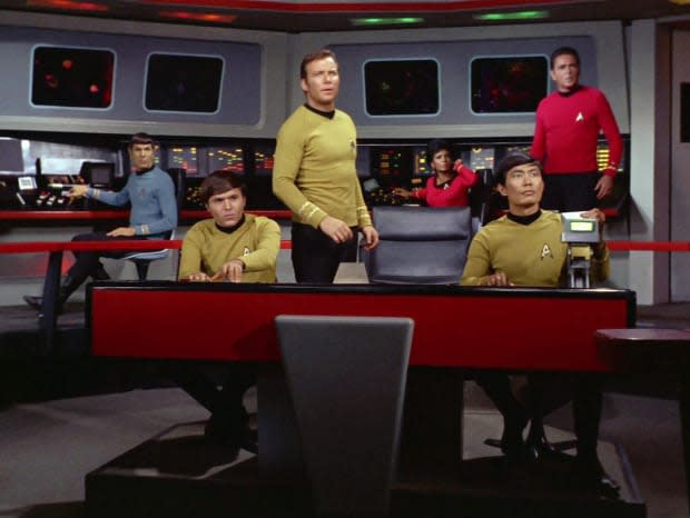 Leonard Nimoy as Mr. Spock, Walter Koenig as Pavel Chekov, William Shatner as Captain James T. Kirk, Nichelle Nichols as Uhura, George Takei as Hikaru Sulu and James Doohan as Montgomery "Scotty" Scott on the bridge of the Starship Enterprise in the "Star Trek" episode "Spock's Brain"<p>CBS via Getty Images</p>