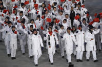 <p>Similar to Korea, the all-white look is never a bad one, and with a touch of red and black, China did a nice job with their outfits. </p>