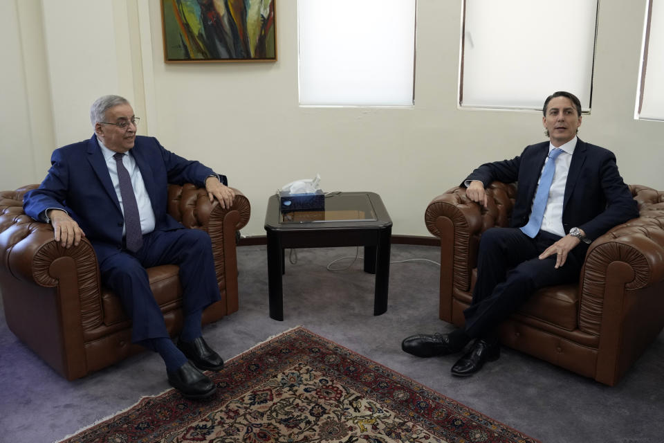 Lebanese Foreign Minister Abdallah Bouhabib, left, meets with U.S. Envoy for Energy Affairs Amos Hochstein in Beirut, Lebanon, Tuesday, June 14, 2022. Hochstein arrived in Beirut on Monday for a two-day visit in hopes of mediating a maritime border dispute between Lebanon and Israel. (AP Photo/Bilal Hussein)