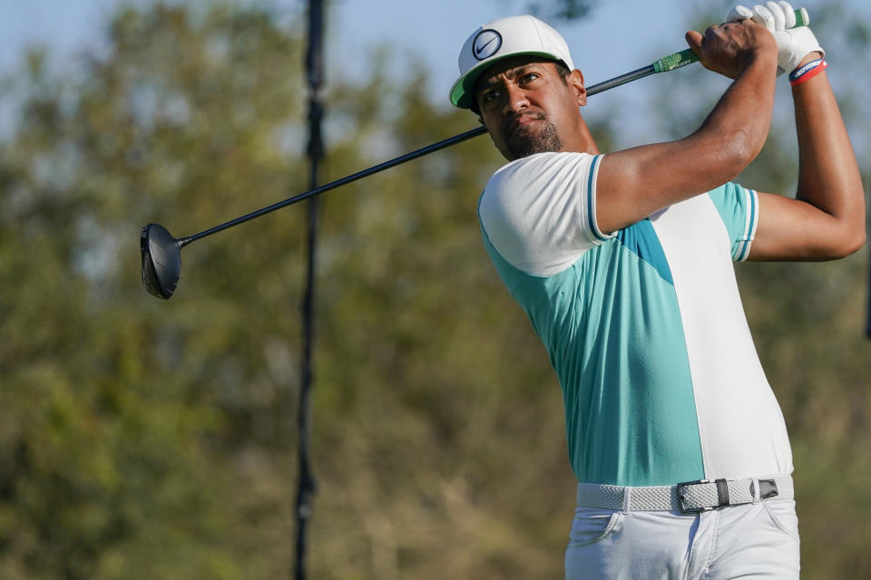 Tony Finau, of the United States, tees off on the 14th hole during the second round of the Mexico Open at Vidanta in Puerto Vallarta, Mexico, Friday, April 29, 2022. (AP Photo/Eduardo Verdugo)