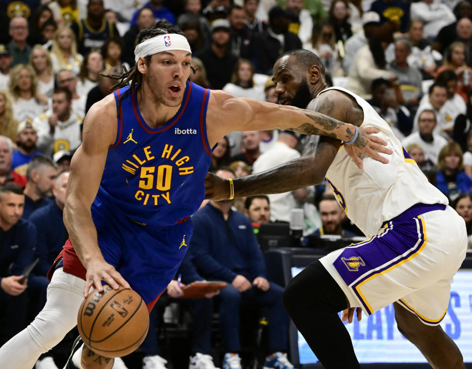 DENVER, CO - APRIL 20: Denver Nuggets forward Aaron Gordon (50) drives to the basket against Los Angeles Lakers forward LeBron James (23) in the first quarter during the first round of the NBA playoffs at Ball Arena in Denver, Colorado on Saturday, April 20, 2024. (Photo by Andy Cross/MediaNews Group/The Denver Post via Getty Images)