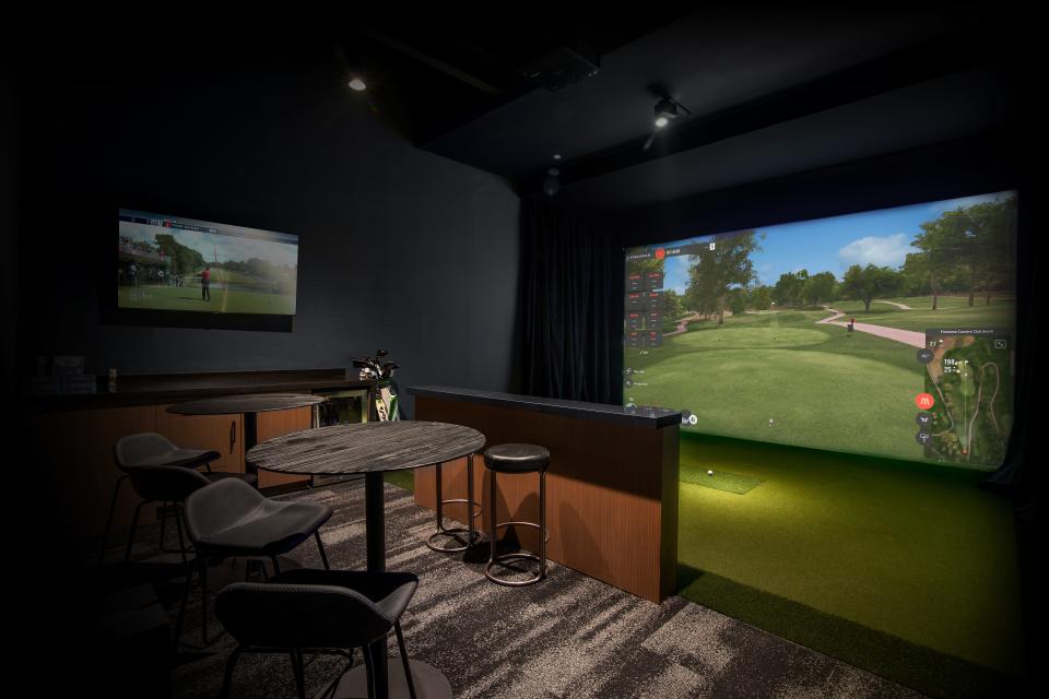 Golf simulator suite at 111 Olive, a renovated office building in downtown West Palm Beach.