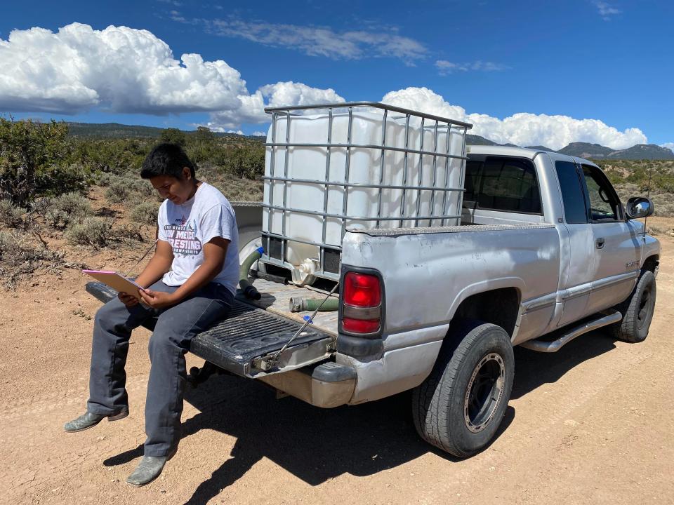 To log onto his online class at Newcomb High School, Jake had to drive half a mile down a rocky dirt road to get cell phone reception.