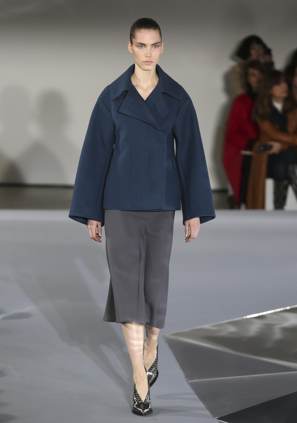 A model wears a creation for Jil Sander women's Fall-Winter 2013-14 collection, part of the Milan Fashion Week, unveiled in Milan, Italy, Saturday, Feb. 23, 2013. (AP Photo/Antonio Calanni)