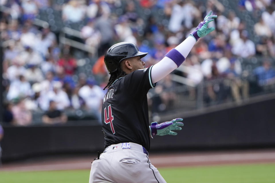 Arizona Diamondbacks' Ketel Marte reacts as hitting a two-run home run during the ninth inning of a baseball game against the New York Mets at Citi Field, Sunday, June 2, 2024, in New York. (AP Photo/Seth Wenig)