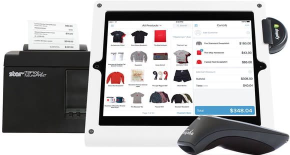 A tablet with the Shopify app, a hand-held scanner, and a receipt printer.