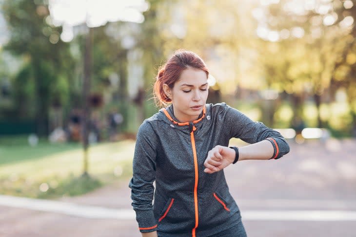 runner-checking-smartwatch